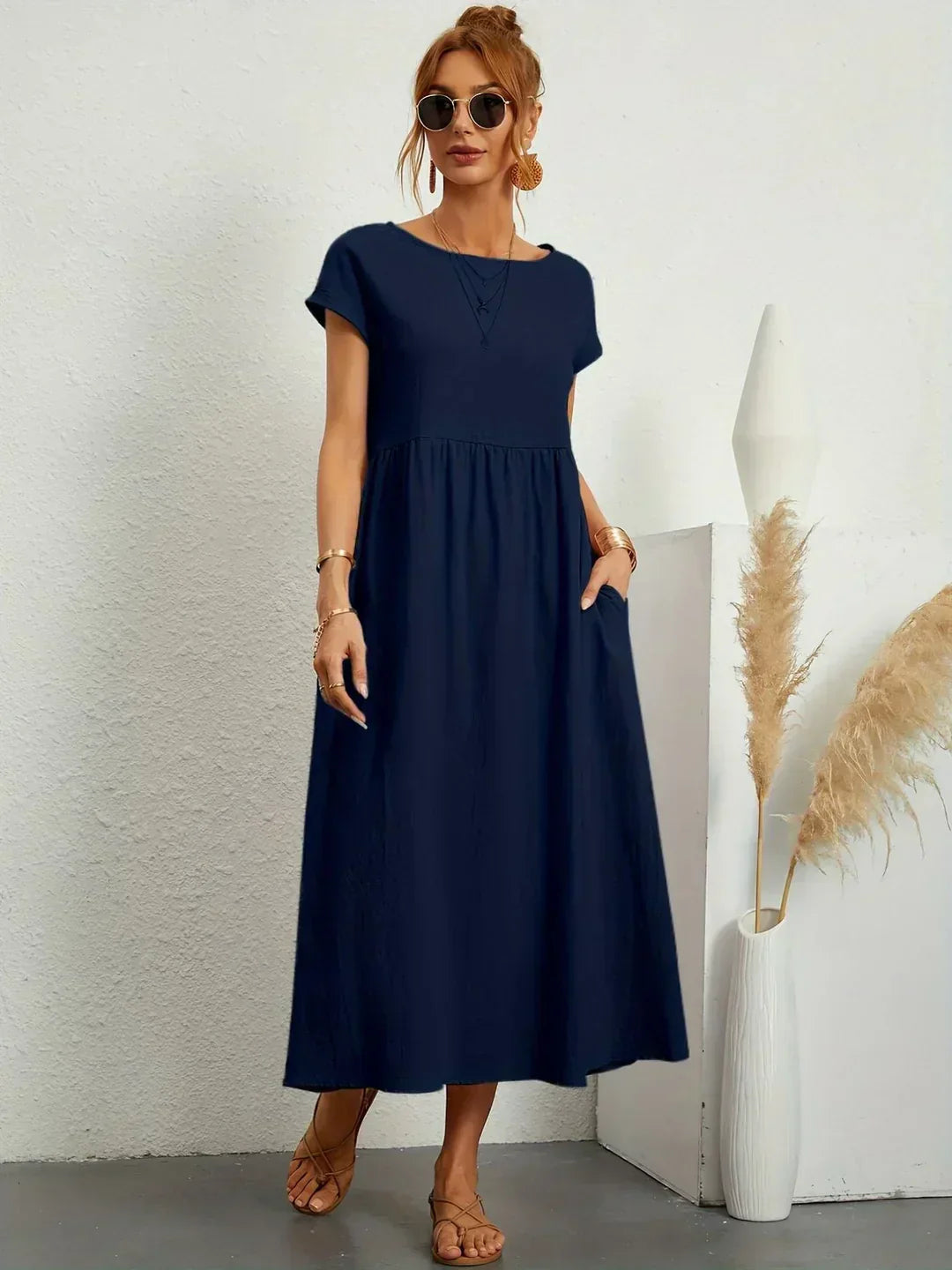HEIKE™ – Flytende midikjole av tidløs eleganse