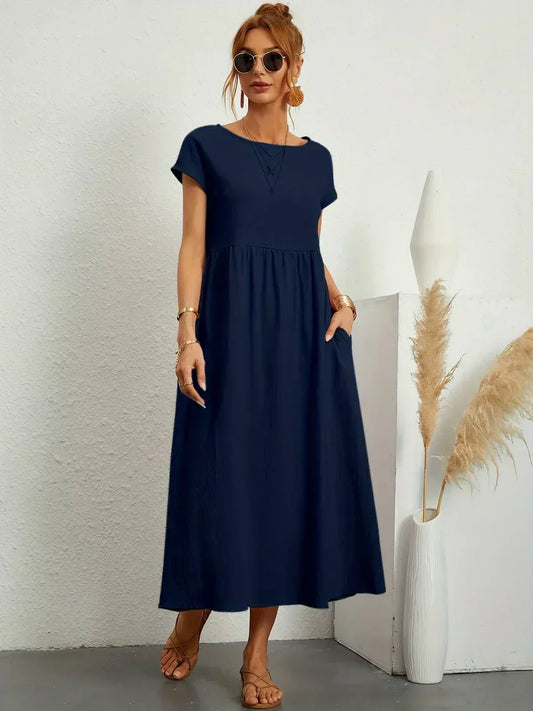 HEIKE™ – Flytende midikjole av tidløs eleganse