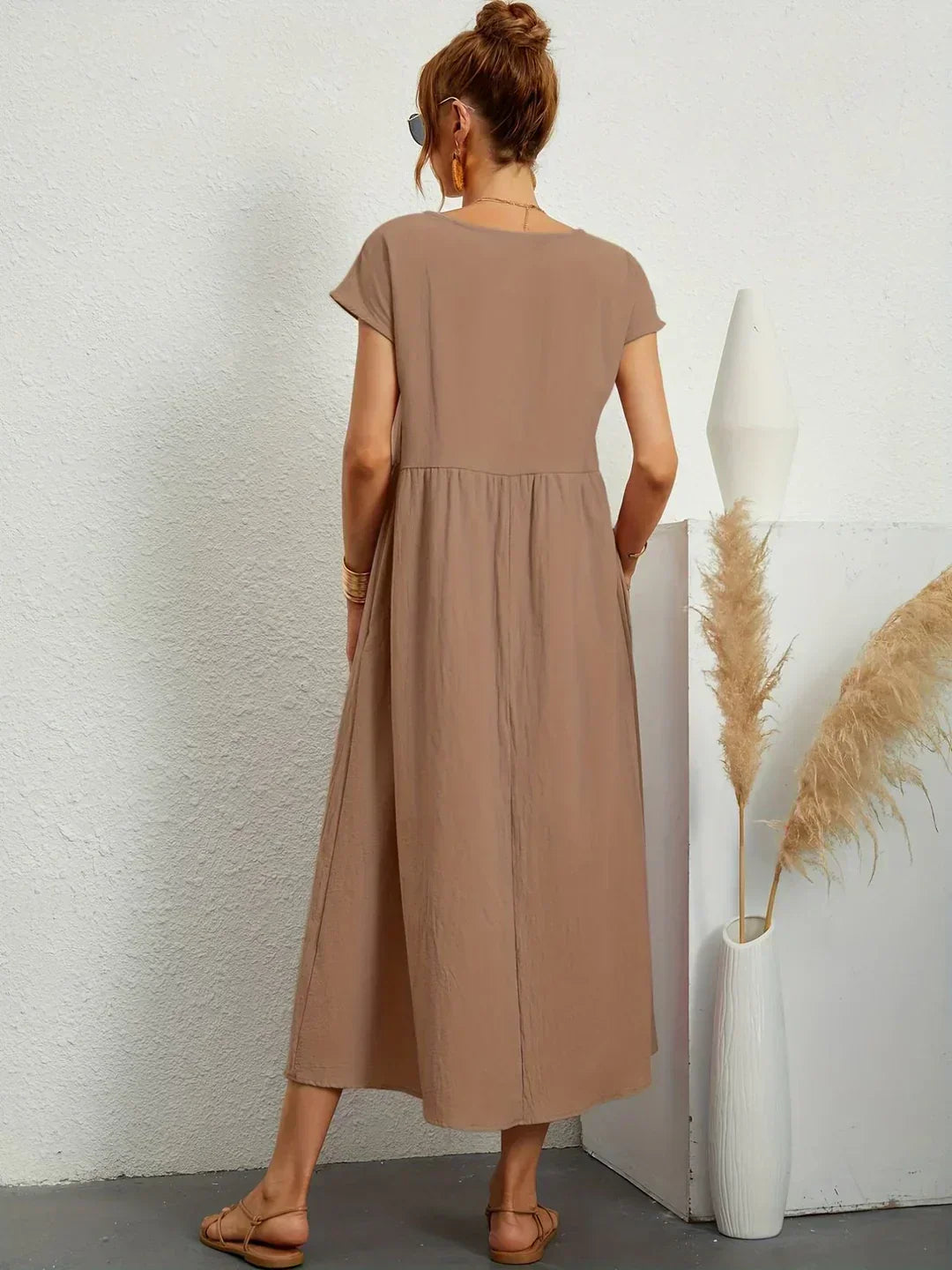 HEIKE™ – Flytende midikjole av tidløs eleganse