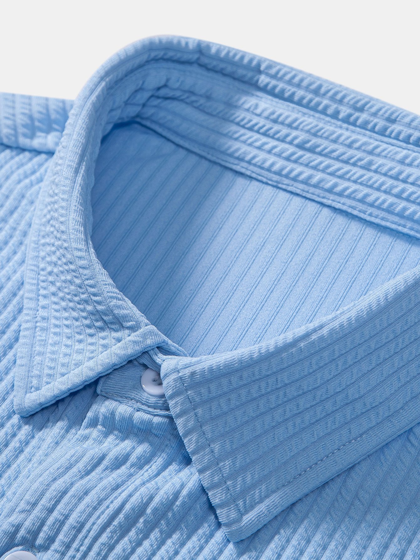 Muskelpassform ribbet skjorte med knapper og shorts